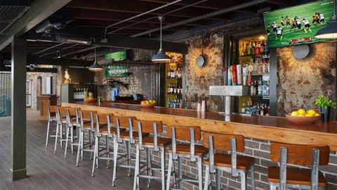 Broken Keel. A bar with many silver stools