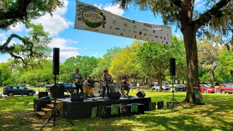 Earth Day Celebration Returns. Band plays in park