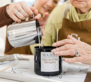 Family Fun Sea Love. a woman pouring something