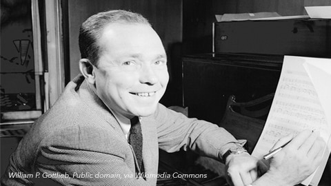Johnny Mercer. A black and white photo of a man smiling
