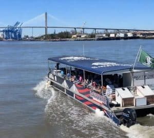 Savannah Harbor Cruises. a cruising tour boat on a waterway