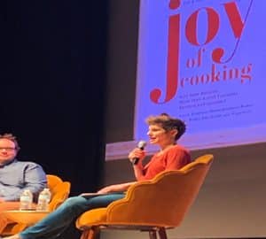 Savannah Book Festival. Woman with microphone and man on a stage