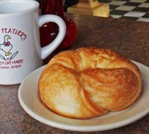Best Breakfast at Goose. Goose Feathers Cafe mug and croissant
