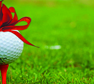 The Gift of Golf. A golf ball on a tee