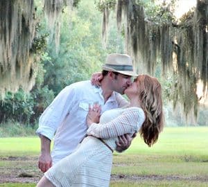 9 Nuptial Proposal Ideas. man in white hat, dipping woman kissing her