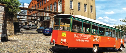 Old Town Trolley Tours. orange and green trolley