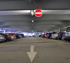 Free Parking for the Holidays. parking garage with arrow pointing
